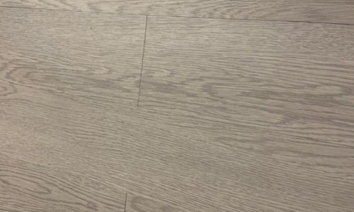 Gray laminate flooring that looks like wood